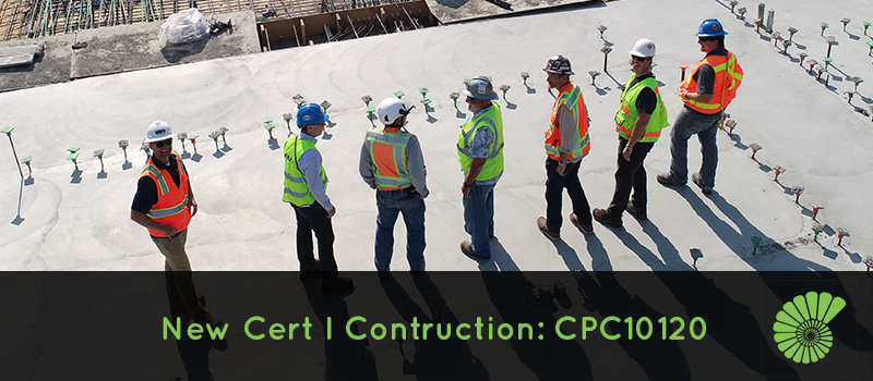 Seven construction workers on a building site, text reads New Cert I Construction: CPC1020 with Ammonite's logo on the right hand side of the text