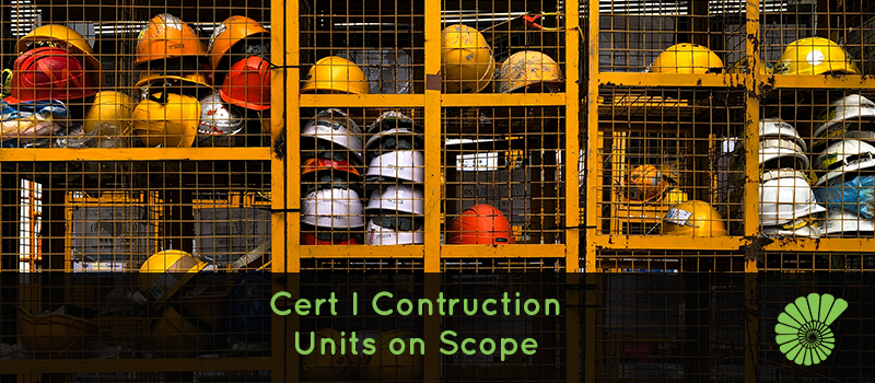 Storage container on building site with a number of different hard hats, text reads Cert I Construction Units on Scope
