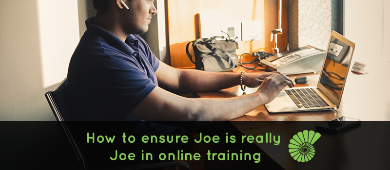 Man working on a computer with headphones in. Text reads 'How to ensure Joe is really  Joe in online training' with the Ammonite logo on the right hand side of the text